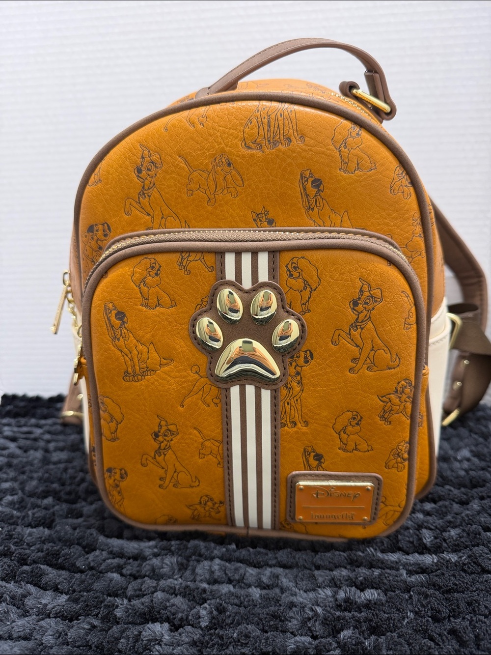 Loungefly Disney tan and brown Lady and the Tramp Paw Accent Mini Backpack